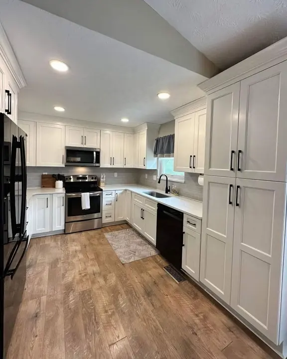 White kitchen with floor-to-ceiling pantry cabinets